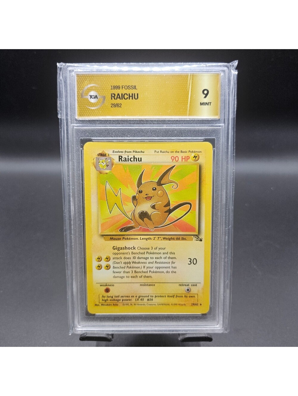1999 Fossil Raichu Pokémon Card TGA Graded 9 Mint